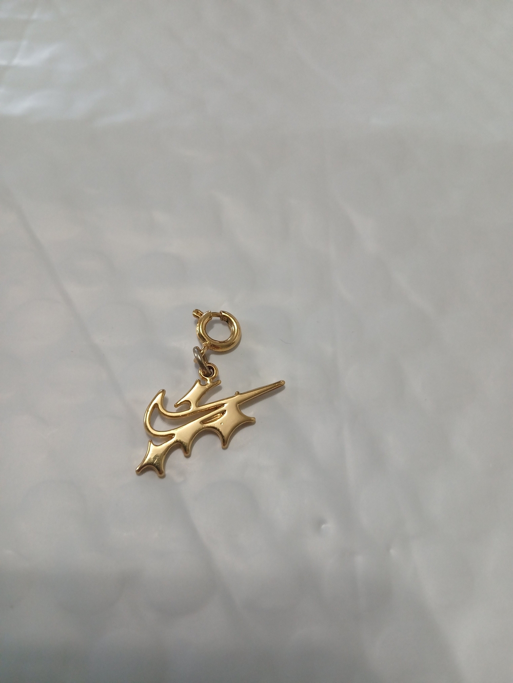 Gold Tone Abstract Charm Pendant for Women. WITH a NIKE CHARM